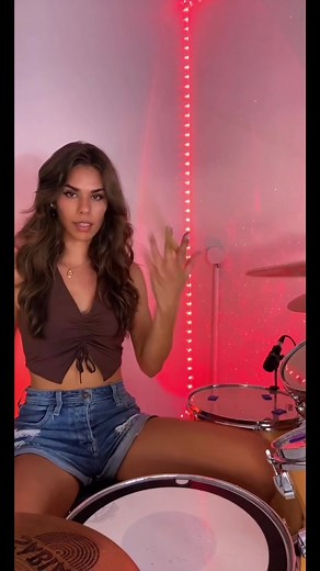 Female Drummer Showcases Rhythm and Skill