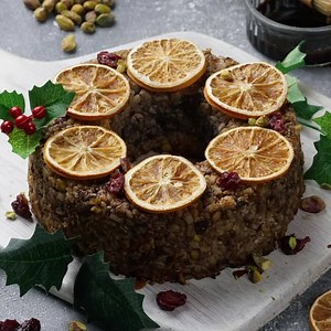 319K views · 24 reactions | Create the ultimate Christmas dinner centrepiece with this wonderfully decadent vegan nut roast! Packed with organic tofu, wild mushrooms, pistachios, cranberries, pearl barley and chickpeas, it’s loaded with filling protein and bursting with festive flavours. Serve warm straight from the oven with a medley of seasonal vegetables and drizzle with pomegranate molasses for a truly memorable meal! | Cauldron Foods | Facebook