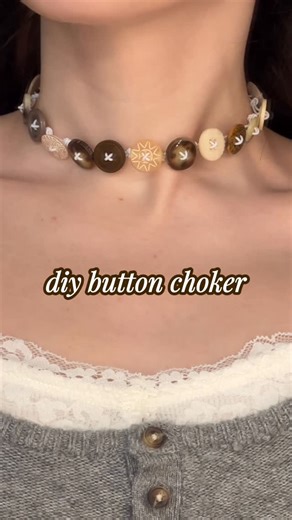 Megan Weller 🤍 diy fashion + beauty on Instagram: "tbh I think buttons would’ve been in for 2026 with or without the 365 button girl’s comment thread 💀 this time I made a choker style necklace - I do have a couple more button craft ideas, so lmk if I should continue this series! #buttons #diyjewelry #365buttons #diynecklace"