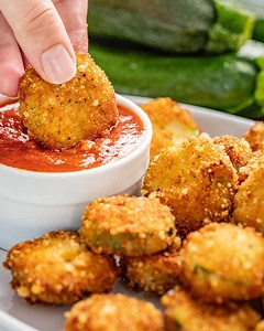 ✅ RECIPE: https://thestayathomechef.com/parmesan-fried-zucchini/ Parmesan Fried Zucchini is an easy-to-make, crisp, yummy appetizer or snack, perfect for all that summer zucchini. And oh so delicious dipped in marinara sauce! | The Stay At Home Chef