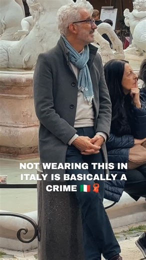 If you know, you know. 😂 In Italy, forgetting your scarf in fall or winter is basically a medical emergency. Italians swear that even the smallest draft can cause la cervicale — neck pain, headaches, or even fever — so you’ll see people fully bundled up when it’s 70°F. So yes, when in Italy bring the scarf. 🧣🇮🇹 #italyculture #italianhabits #letsseeitaly #italytravel #romelife #italytips #italyhumor #italytravelguide | Let's See Italy