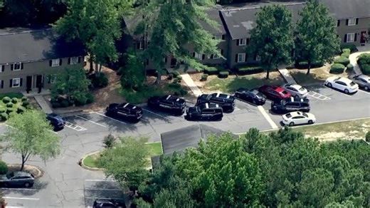 DeKalb County Police officers respond to apartment complex