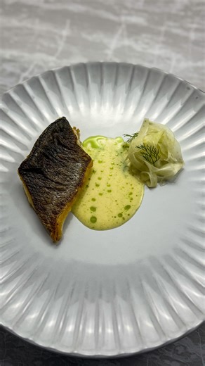 Guilherme Paulo | 🇵🇹🇧🇪 on Instagram: "Sea Bass / Pickled Fennel / Beurre Blanc Delicately seared sea bass paired with lightly marinated fennel, served over a velvety cream beurre blanc and finished with a bright herb oil. 📲 For more recipes, click on the link in the bio ! #finedining #gastronomy #culinaryarts #cheflife #platingart #michelinstar #gourmetfood #foodpresentation #creativecuisine #worldchef #seafoodlover #finecuisine #culinarycreation #gastronomicart #restaurantlife #seafood #fi