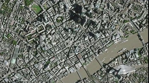 Earth zoom in from outer space to city. Zooming on London, England. The animation continues by zoom out through clouds and atmosphere into space. View of the Earth at night. Images from NASA. 4K