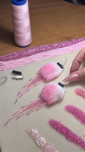 This Claw on Instagram: "CH’ES COLLECTION (Pink) 🩷🩷 www.thisclaw.com/s/shop Now available! 5.5-6.2” FUR DROPS. Stainless Steel Hooks. Stainless Steel Ribbon Claw Connector. Bugle Beads. Czech Seed Beads. Rabbit Fur. Polyester Thread. Valued at $120. Nails by @onglesjt ID: Romme- Strawberry #beadwork #earringsofinstagram #indigenousart #beadedearrings #nativeamerican"