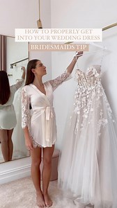 Bridesmaid tip: Here’s how to help your bride properly get into her wedding dress, without causing any damage or stress 🤍 Gown: Palmer by @enzoani, currently available in our Sydney boutique ✨ Click the link in our bio to book an appointment. #weddingtip #weddingtips #weddingtipsandtricks #weddingdaytips #bridesmaidstips #bridesmaidtips #weddingdresshack #weddingdresstips #weddingreel #weddingreels #bridalstyle #weddingdress #weddinggown #alineweddingdress #floralweddingdress #laceweddingdress
