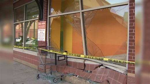 Police investigating after car slams into CVS in Boston