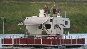 Floating Dock Converted into a Camper Barge - RollingBarge.com