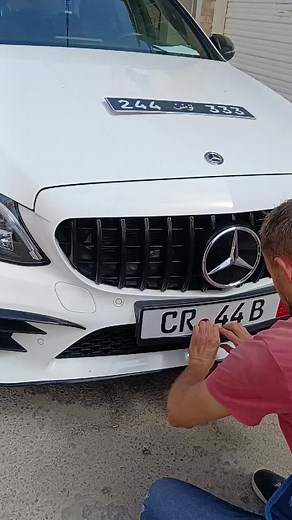Installing a License Plate on a Mercedes-Benz Car