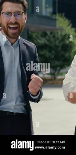 Upset African American business woman celebrating Caucasian businessman in city different emotions colleagues contrast failure victory yelling win achievement success disappointed female male outdoors Stock Video Footage - Alamy