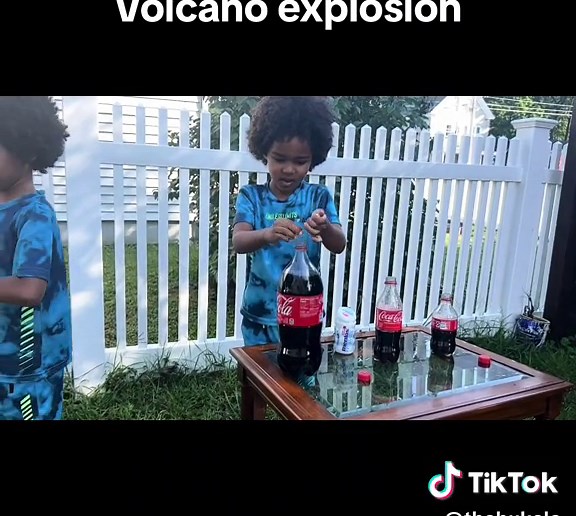 Coke and Mentos Volcano Instructions Step 1: Prepare your Soda. Open your bottle of soda carefully and position it on even ground so it can not tip over! Step 2: Prepare Mentos. Now unwrap a roll of mentos. Step 3: Add Mentos. The goal is to drop the mentos in the bottle at the same time. ... Step 4: Eruption. #volcanoexperiment #cocacolavsmentos #cocacolavsmentos😱 #thebukelegroup