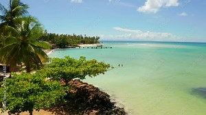 Aerial view of the French Polynesia and Raivavae island with sandy beaches, coral reef and green islets in azure turquoise blue lagoon. Tubuai Islands (Austral Islands), Oceania. and Tahiti.
