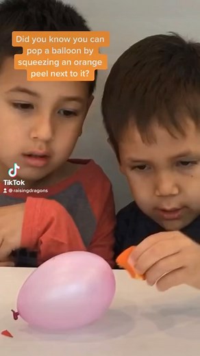 Pop A Balloon With An Orange Peel 🍊 ages 3 🍊 Did you know you can pop a balloon with an orange peel? It's true and such a simple science experiment to do at home! https://www.raisingdragons.com/pop-a-balloon-with-an-orange-peel-age-3/ | Raising Dragons - Activities For Kids