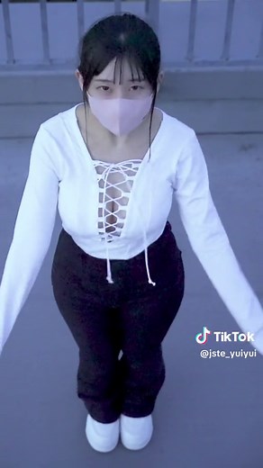 Casual Dance Moves on a Rooftop During Twilight