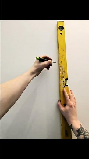 Handyman installing stair handrail kit