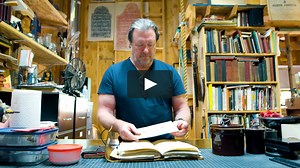 See How a Paper Propmaker Crafts Fake Documents for Films