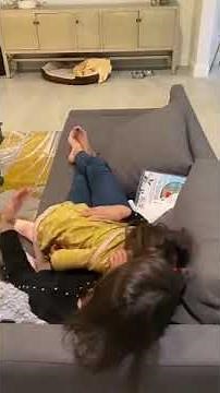 Kid Enjoys Getting Tickled By Woman on Couch - 1169869-2