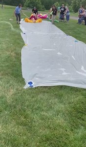 Staff at an assisted living facility made a slip and slide for their residents.