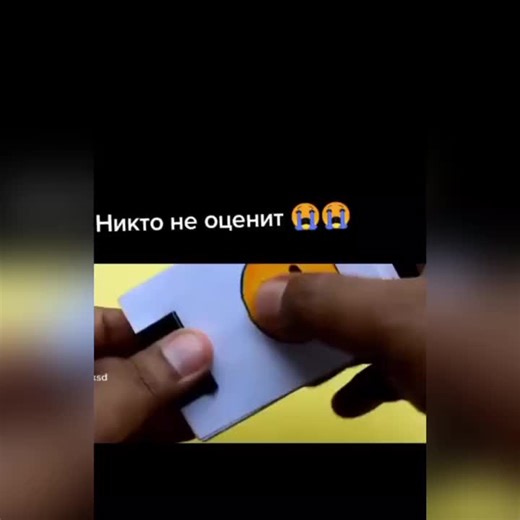 Close-Up of Smiley Face Object Manipulation