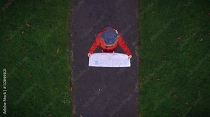 4k Aerial above Houses and Child Looking in Map, zoom out fast