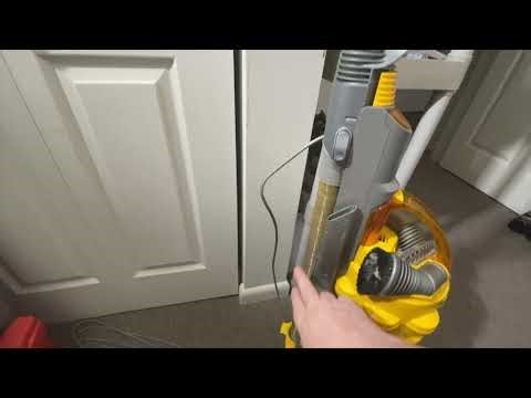 I sucked up a sock with my Dyson vacuum , what do I do ?