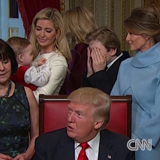 First Son Barron Trump plays peekaboo with his nephew who is being held by Ivanka Trump while Donald J. Trump signs his first orders as President in the Capitol http://cnn.it/2jWzgiZ | CNN