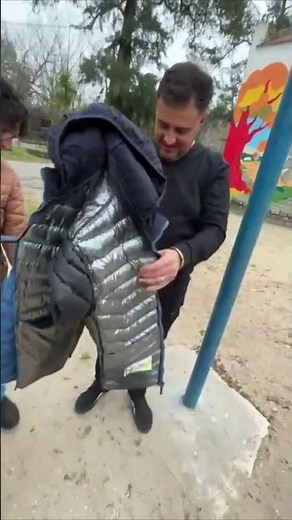 Man Jumps from Swing, Jacket Snags, Rips off