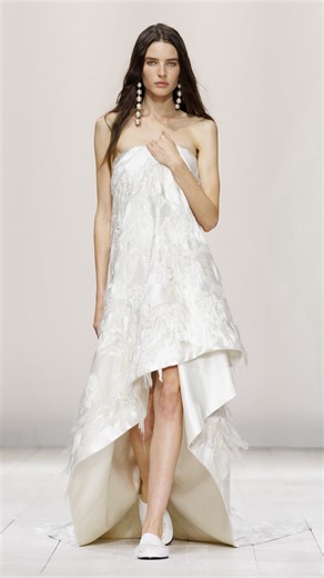 GIVENCHY on Instagram: "Libby wears the bed sheet dress in duchesse satin with avalanche rose satin stitch embroidery, spiky pearl earrings and slides. Givenchy by Sarah Burton Styling Camilla Nickerson Casting @jesshallettcast Hair @guidopalau Makeup @lucia_pieroni Nails @amaquashie Music @studiofredericsanchez"