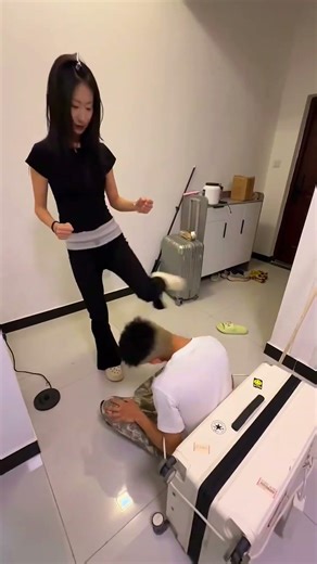 He's been trying to hit his brother's arm for ages... and he never succeeds