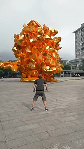 1.7M views · 4.5K reactions | Boy throws ball to smash the golden statue of cartoon duck in the square | Gear Items | Facebook