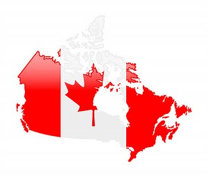 High detailed vector map of Canada with national flag on white...
