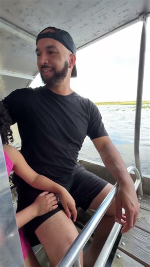 Erick Taylor and his family spot a wild American alligator on their Everglades airboat tour