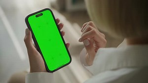 Browsing Online on Chroma Key Green Screen Smartphone
