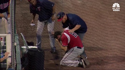 A bat boy was hit in the face by a foul ball during a baseball game. Warning: The video may be disturbing to some viewers. | NBC DFW