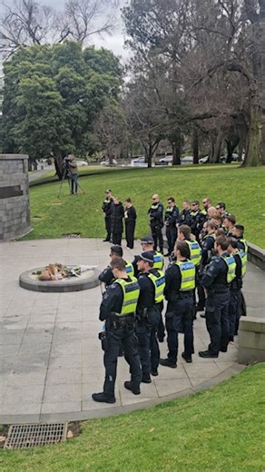 Police pay their respects at memorial after Porepunkah shootings