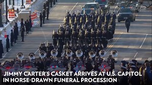 Jimmy Carter's Casket Arrives at U.S. Capitol in Horse-Drawn Funeral Procession