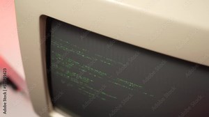 Vintage Computer Monitor 80s 90s With Green Codes on Screen