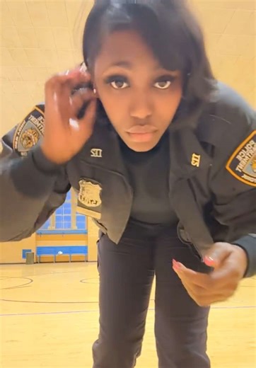 Singing Lady Cop Brings Life to an Empty Gym