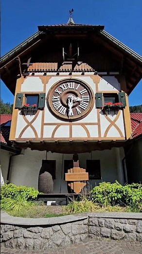 World's largest cuckoo clock in Triberg, Germany. The clockwork is 15' tall and weighs 6 tons