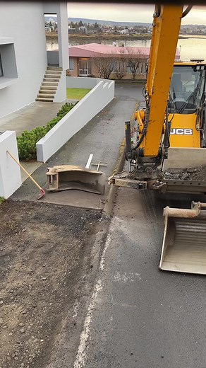 JCB Excavator in Action at Construction Site
