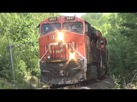 Decent Size Manifest Train CN 507 Rolling thru Salt Springs, NS at Track Speed