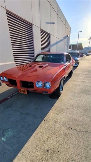 1970 Pontiac GTO "The Judge" – The Ultimate Ram Air Powerhouse (400ci V8, Orbit Orange)