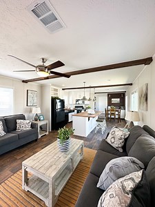 🏡 Introducing The Madison: Your Dream Single Wide! ✨ Key Features: 🛏️ 3 Bedrooms 🛁 2 Baths w/ Jack and Jill layout 🍽️ Designated Dining Space 🌟 Accent Shiplap Wall 📺 Built-in Entertainment Center with Shelves 🚪 Sliding Glass Door for Abundant Natural Light Imagine the possibilities that this charming home holds – from cozy family dinners in the dining space to lazy weekends spent lounging around the built-in entertainment center. The accent shiplap wall adds a touch of rustic elegance, wh