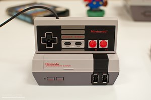 Here are two solutions to NES Mini controller's short cable