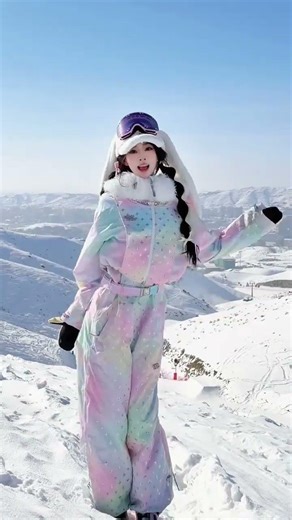 A rainbow rabbit is hopping around on the snow field#Double board girl#Double board