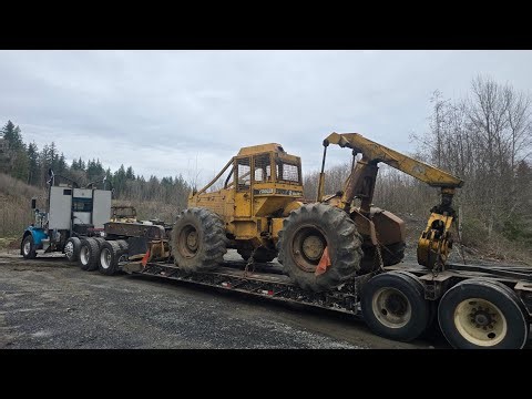 Our new skidder!! Clark 667 dual function grapple skidder!