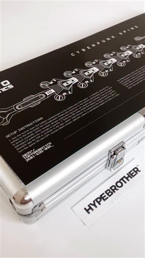 HYPEBROTHER™ on Instagram: "The Cyberpunk Spine is shipping again in new limited production (2026) 🚀 The Sandevistan Cyberpunk Spine is a high-end wearable art featuring multi-color RGB illumination and dynamic light effects wirelessly controlled by mobile app. Inspired by the Neuralware implant featured by David Martinez in Cyberpunk Edgerunners, this futuristic wearable comes with magnets that can be attached to thin clothing or fabrics. Fully handcrafted using 3D printed parts, the Cyberpunk