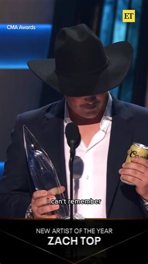 Zach Top was so hyped about his CMA Award for New Artist of the Year that he forgot to put down his beer. 😂 | Entertainment Tonight