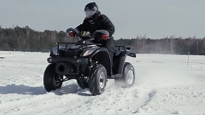 Drift quad on snow