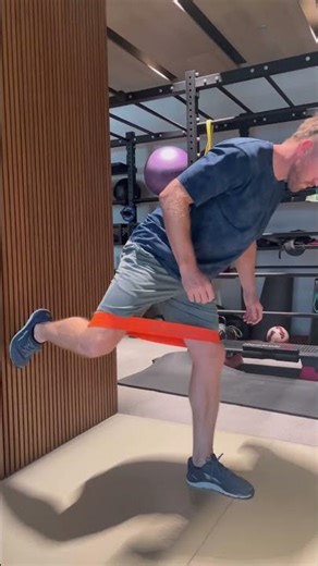 Wall Stabilized Split Stance Banded Hip Rotations